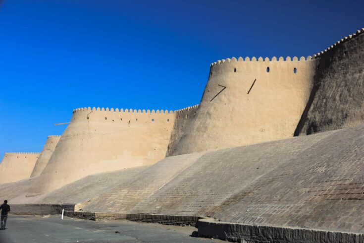 Part of the 10 meter tall wall surrunding old town Khiva travel guide