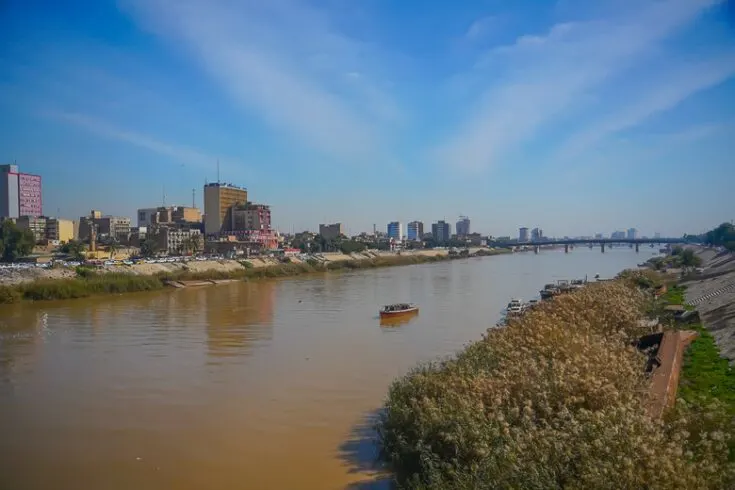 Walking across the Tigris river in central Baghdad