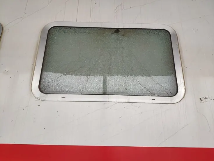 Most of all the windows on the train is cracked Iraq train