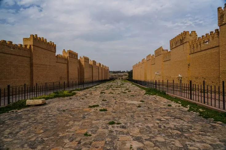 Orginal walk way behind the fence, the rebuilt ruins on the sides