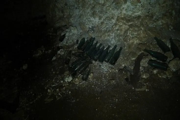 old sake bottels inside 1000man cave Peleliu