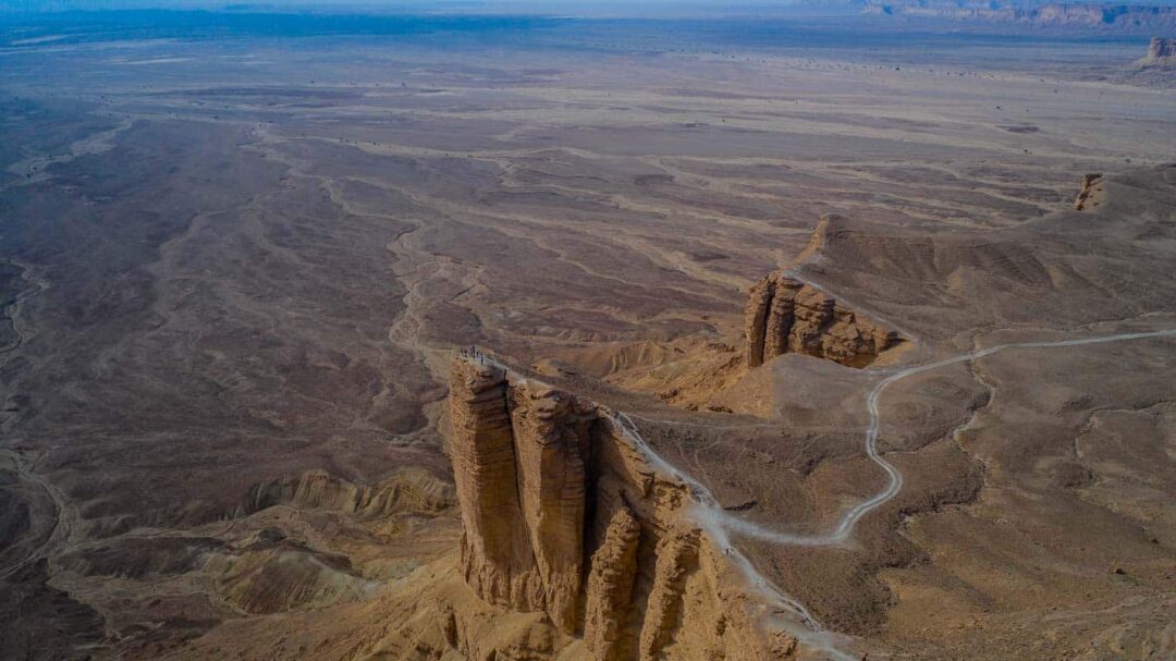 Visiting The Edge Of The World. Saudi Arabia. Unusual Traveler Visiting The Edge Of The World. Saudi Arabia. Unusual Traveler