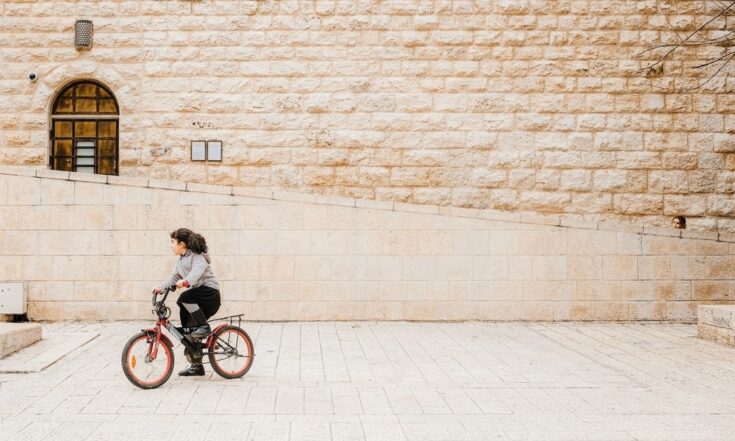 Kid riding a bike in the Jewish Quarter damascus syria